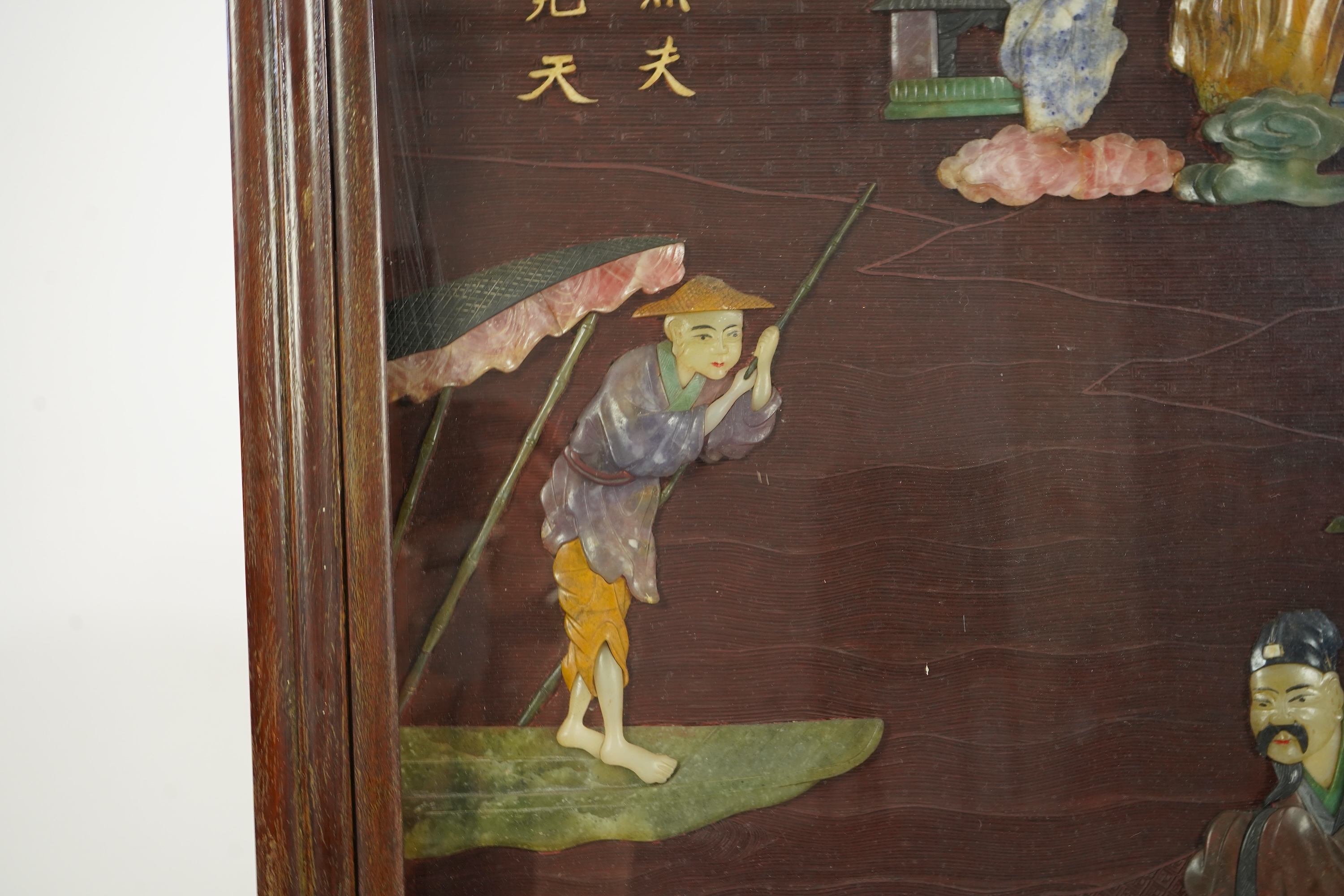 A Chinese carved cinnabar lacquer and hardstone mounted panel, early 20th century